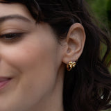 Bow and Tell Huggie Hoops - Gold